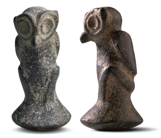 Par de figuras taínas de búho en piedra